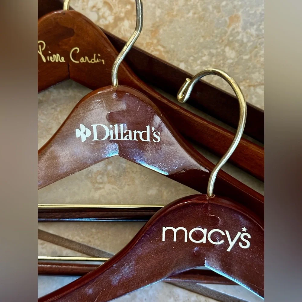 4 Designer/Department Store Wooden Slack Hangers. Dark wood w/gold hanger.